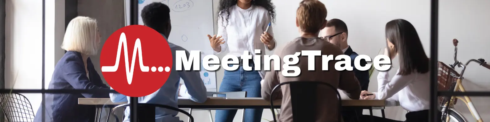 People having a meeting in a bright office with MeetingTrace logo overlay.